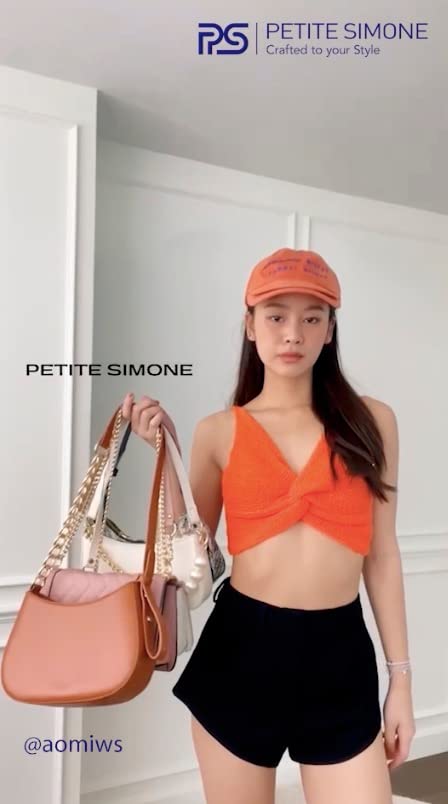 An influencer with Petite Simone bags. This helps to boost their brand awareness and drive sales.