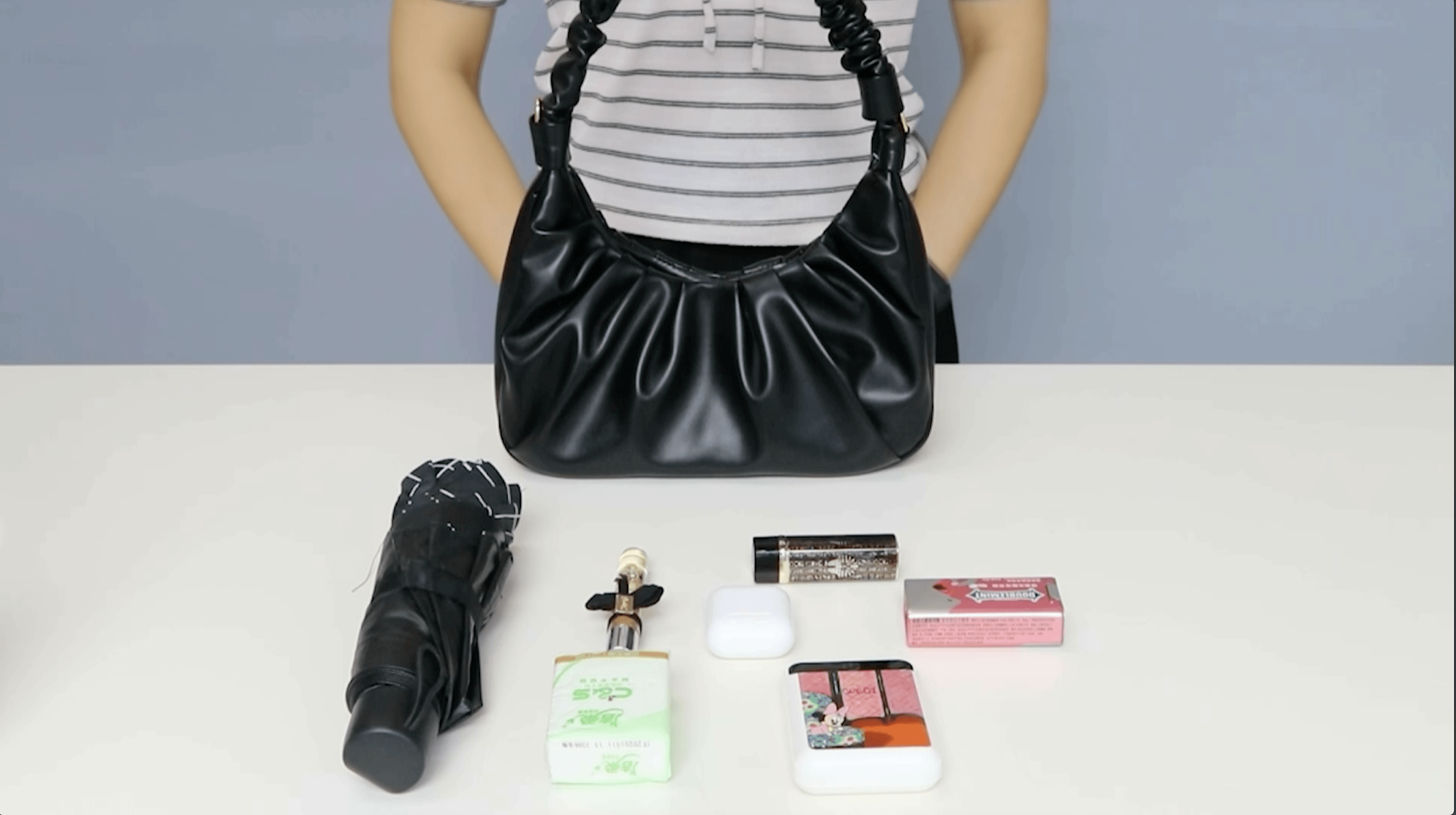 Two examples of Petite Simone's Sponsored Brand Video ads, each featuring their Sofii bag in a different color.