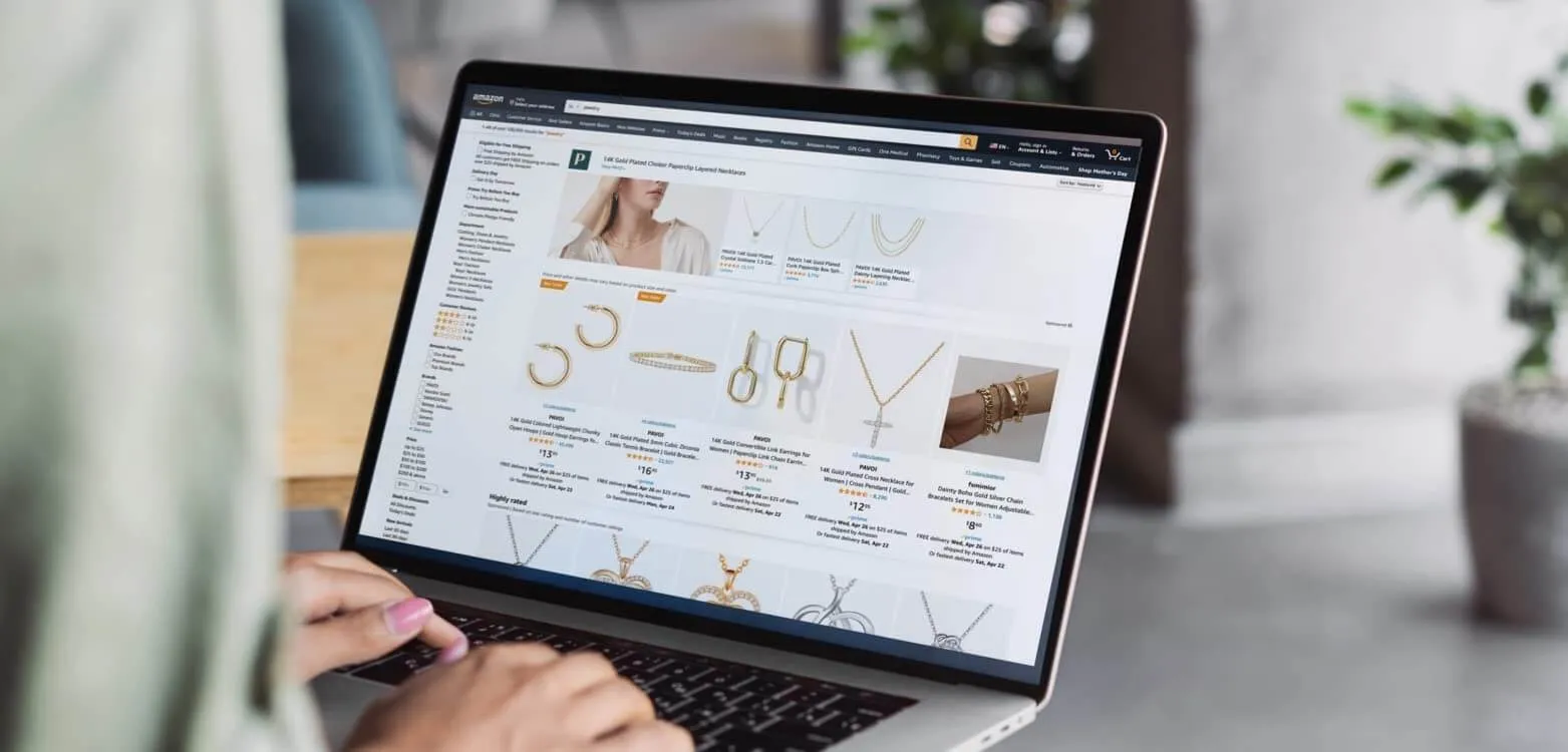 Someone browsing jewelry on Amazon via a laptop
