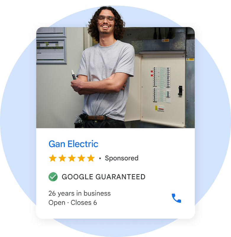 A local ad shows an electrician with long wavy hair standing next to a breaker box.